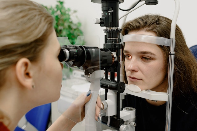 a woman undergoing an eye exam