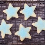 five star shaped cookies on a tray