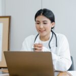 doctor using a laptop for telehealth appointment