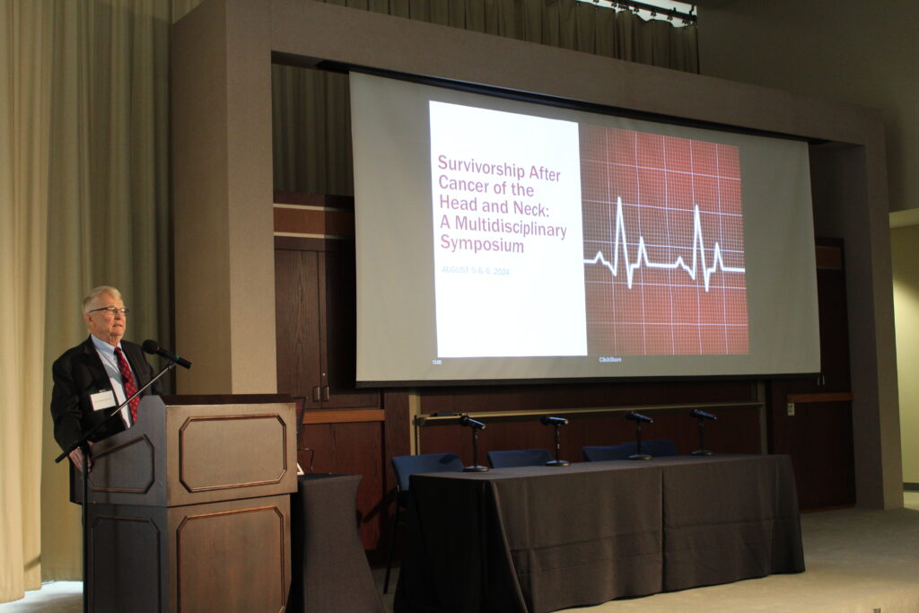 Dr. Johnson speaking at the symposium