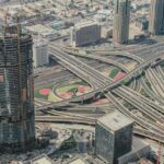 aerial view of city buildings and an interstate highway