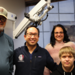 Brecken Peterson and his parents with Dr. Wang