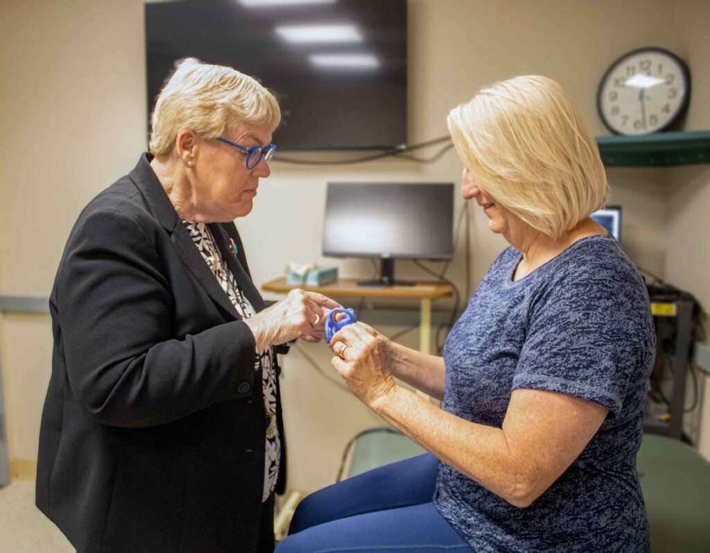 Susan with Dr. Whitney in the clinic