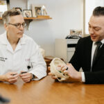 Drs. Snyderman and Choby looking at a 3D model