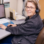 Dr. Catherine Palmer at a desk