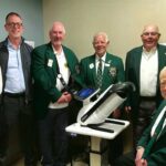 Zaila Hobson, Jake Waxman, and Lions Club members with the new camera