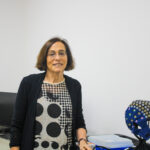 Marlene Behrmann next to one of her projects