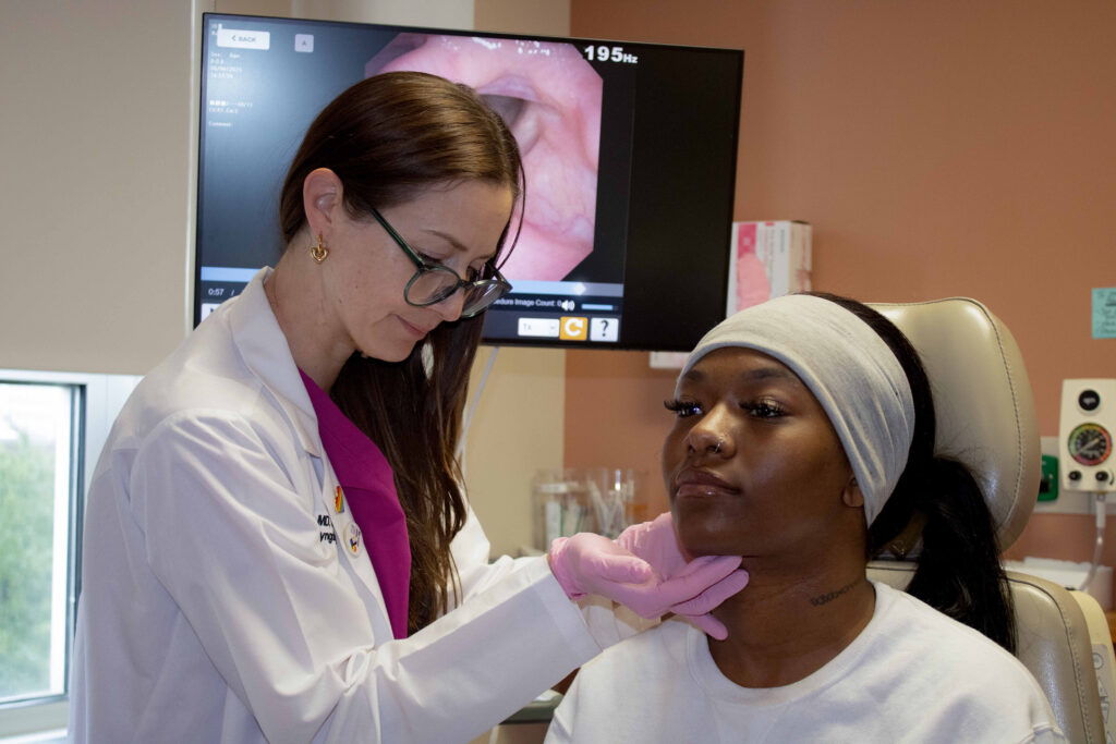 Dr. Chloe Santa Maria with a patient
